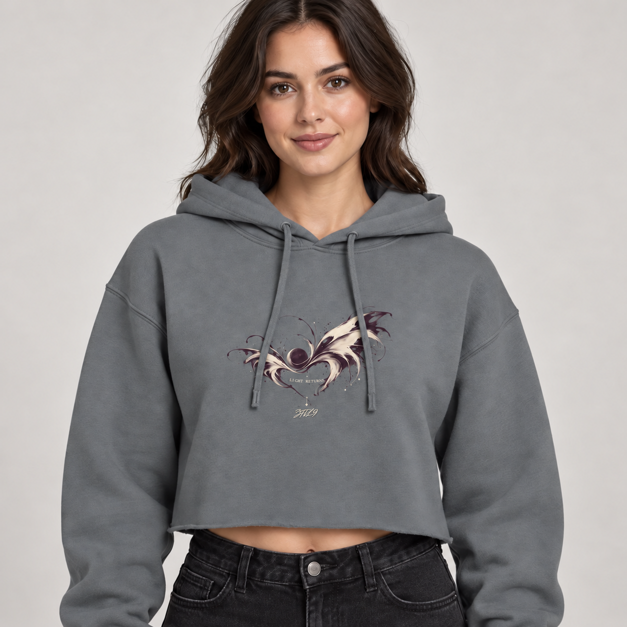 Soft Eclipse Storm cropped hoodie on a model, front artwork visible