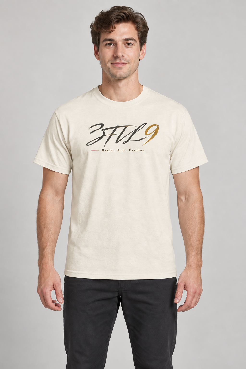 Cursive Studio Tee - original male model and pose, Natural tee with gradient 3til9 logo and Music. Art. Fashion below; digital wearing illustration.