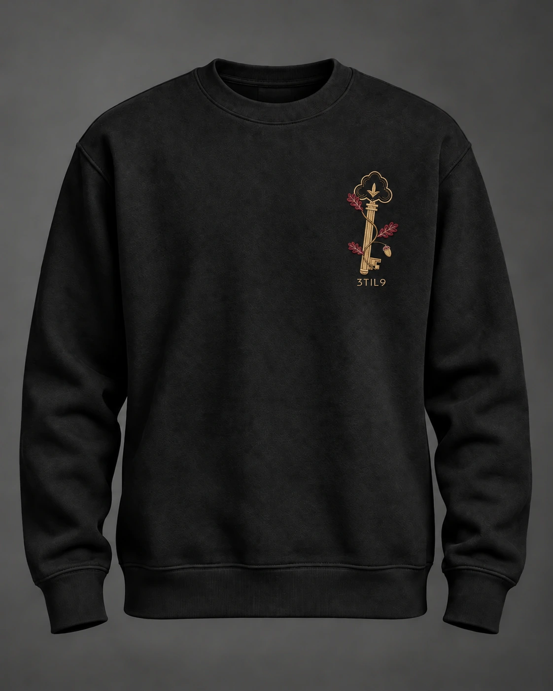 Nocturne Key — crewneck front with the selected embroidery motif; digital visualization.