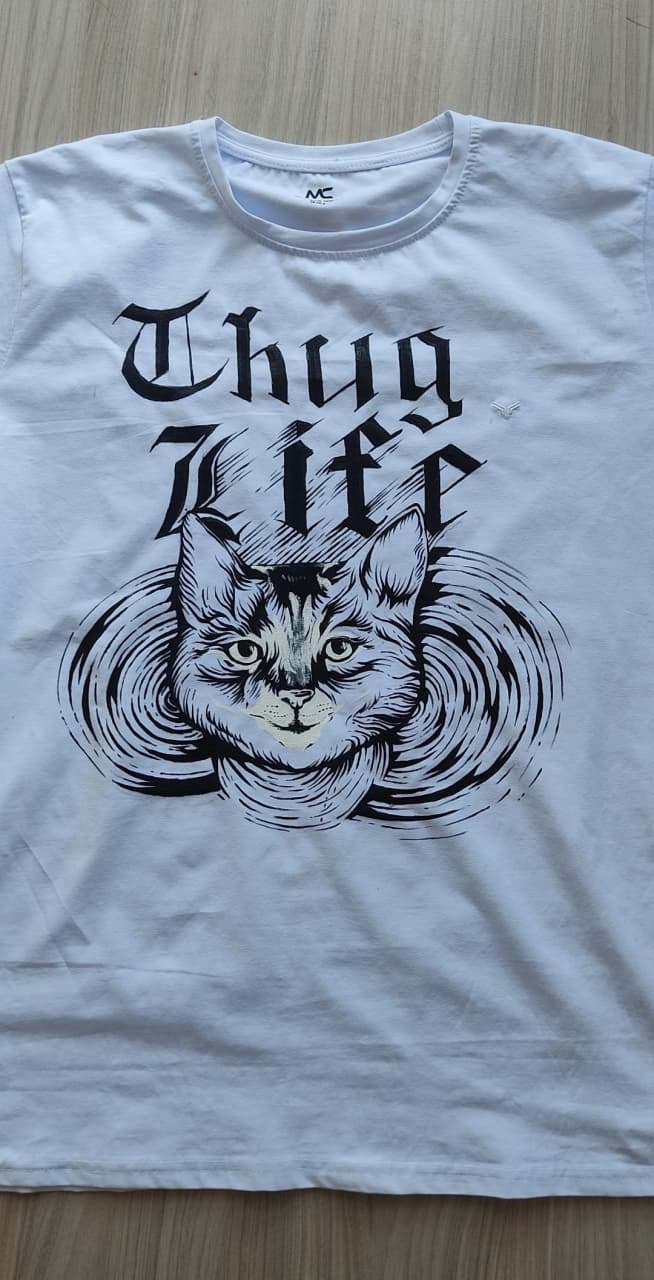 Hand-painted portrait of a real cat beneath Thug Life lettering on a white tee.